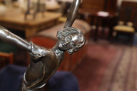 A bronze dancer, signed B. Zach, on marble base overall height 65cm